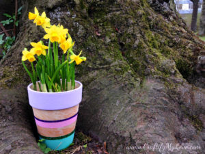 DIY spring and sparkly painted flower pot with glitter and pastel colors made by Habiba from Craftify My Love