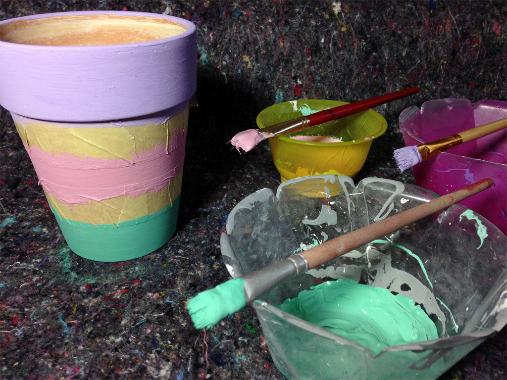 DIY spring and sparkly painted flower pot with glitter and pastel colors made by Habiba from Craftify My Love