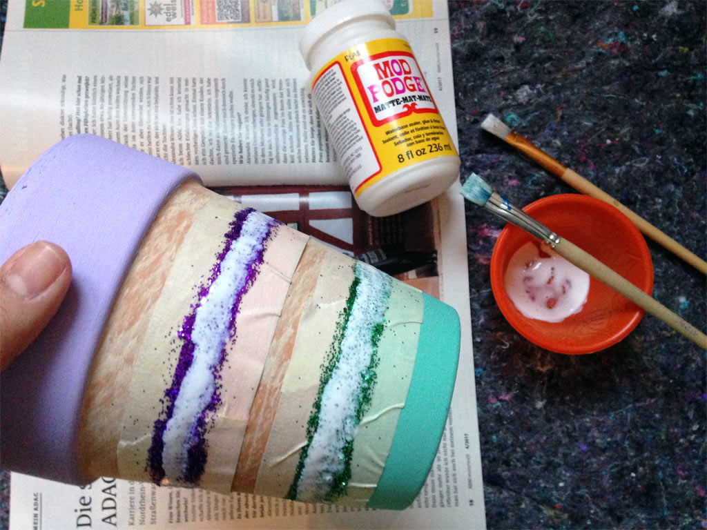 DIY spring and sparkly painted flower pot with glitter and pastel colors made by Habiba from Craftify My Love