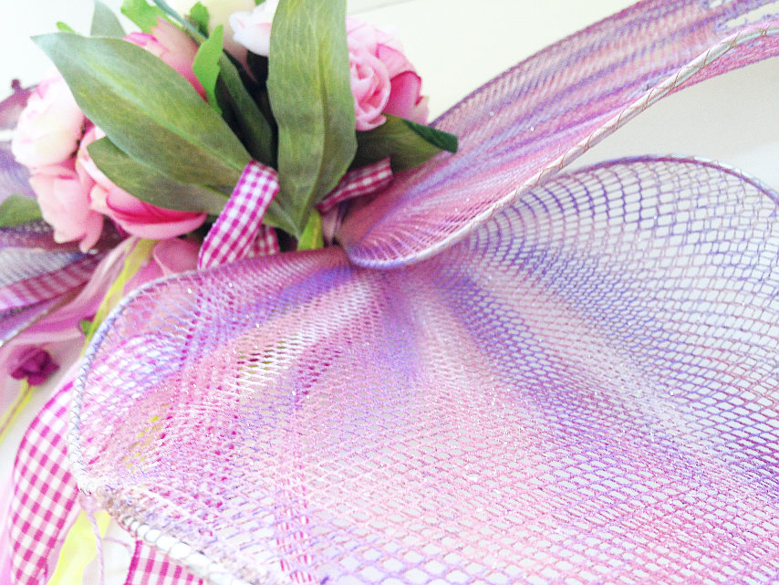 close up of handmade butterfly or fairy wings in pink, lavender and sparkle