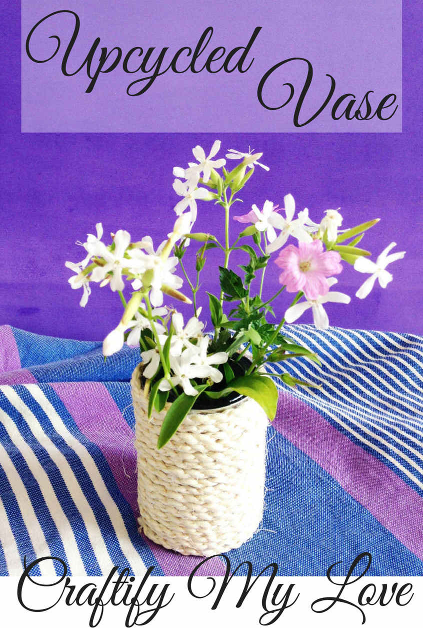 DIY upcycled vase using a tin can and rope