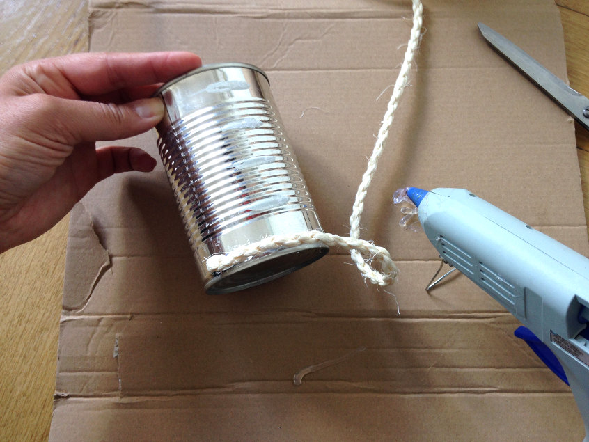 glue the beginning of your rope to the can to get started with your upcycled rope vase