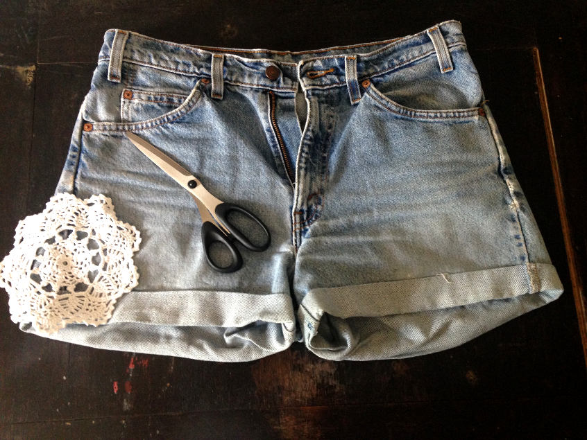You'll need lace, scissors and a sewing machine to make your too tight shorts comfortable again.
