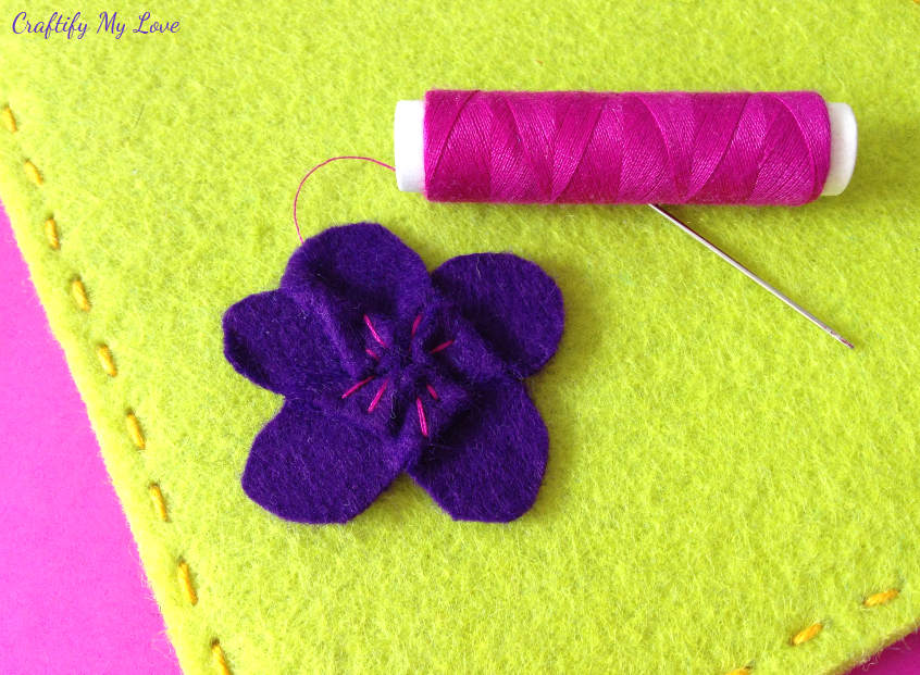 hand stitching details on felt flowers diy tablet sleeve