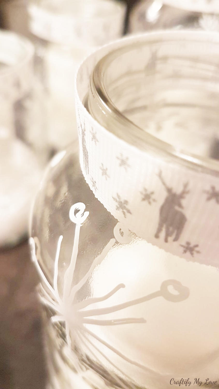 Upcycling jam jars into Christmas candle holders