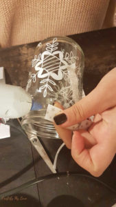 gluing ribbon to recycled Christmas jar candle holder