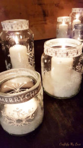 snowflake painted recycled jam jars candle holder