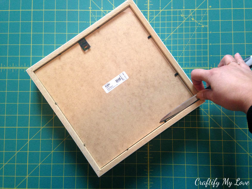 opening and dismantling IKEA frame Ribba for easy craft project creating sewing room decor