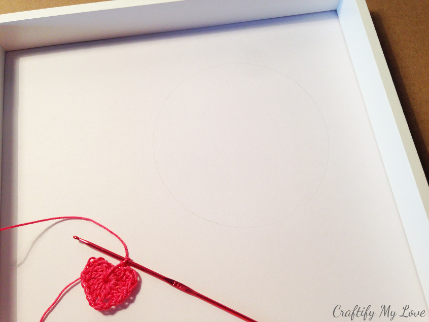 decide on string art design and create a composition