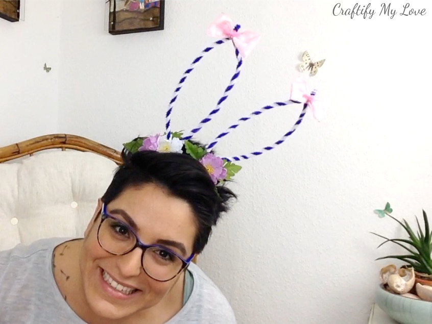 Adults and children can be wearing this cute bouncy purple rose bunny ears headband