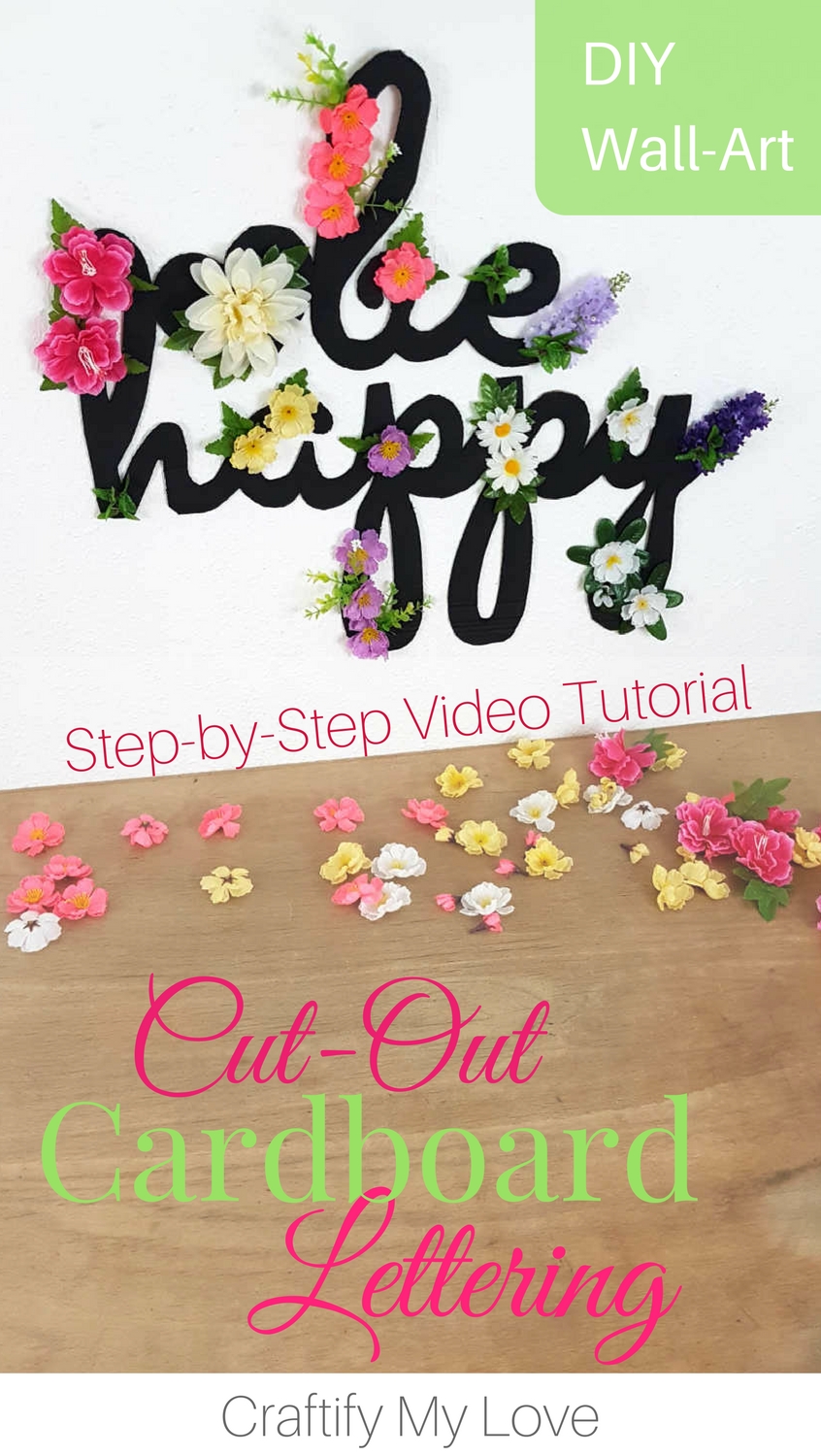 Ready for SPRING or a little MOTIVATION? Learn how to make this recycled cardboard cut-out sign today! Click for Step-by-Step Instructions including Video Tutorial | #behappy #motivationalquote #cardboard #recycling #upcycling #DIY #craftsproject #chalkpaint #silkflowers #dollartree