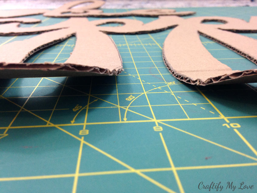 learn how to make a DIY sign from recycled cardboard decorative diy project