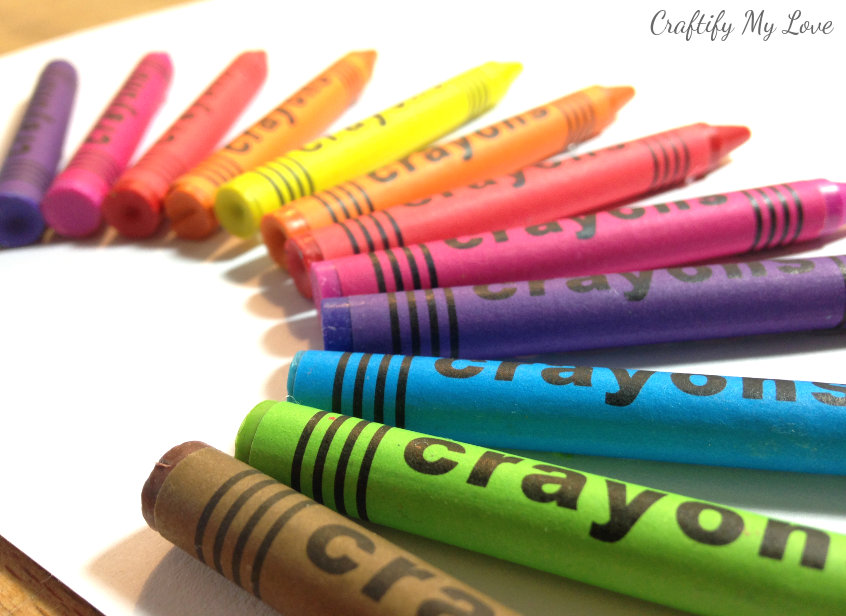 crayons glued in a rainbow to become fireworks craft