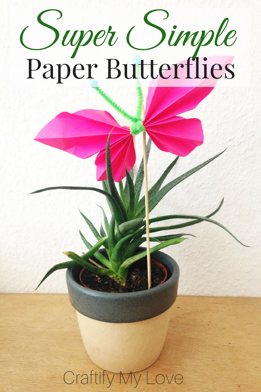 Quick and easy kids craft!!! Accordion fold paper butterfly that can be a plant stick, mobile, gift wrapping element or home decor. #craftifymylove #butterflycraft #plantsticks #kidscraft #papercraft #summeractivity