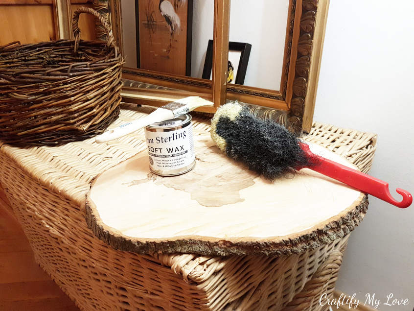 to prepare your wood slice table top, dust the lumber off after sanding it down and protect it from water stains with clear wax