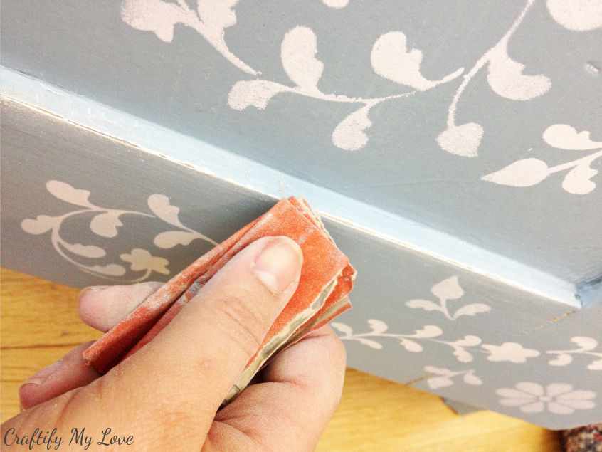 using sanding paper lightly distress your anthropologie dresser knock-off or look alike cabinet