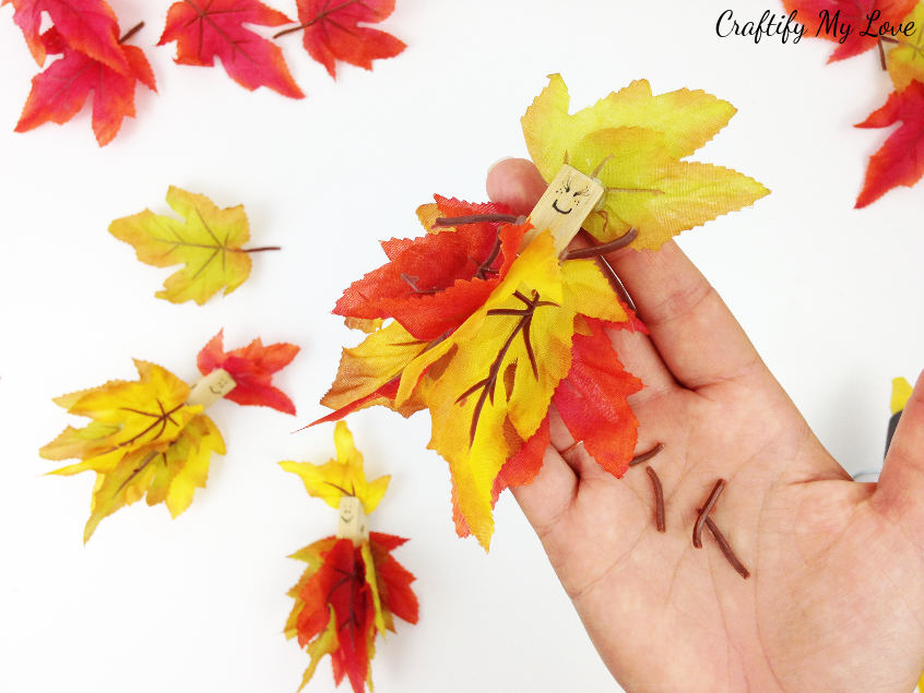 recycle those clipped off fall leaf stems into little arms for your autumn fairy