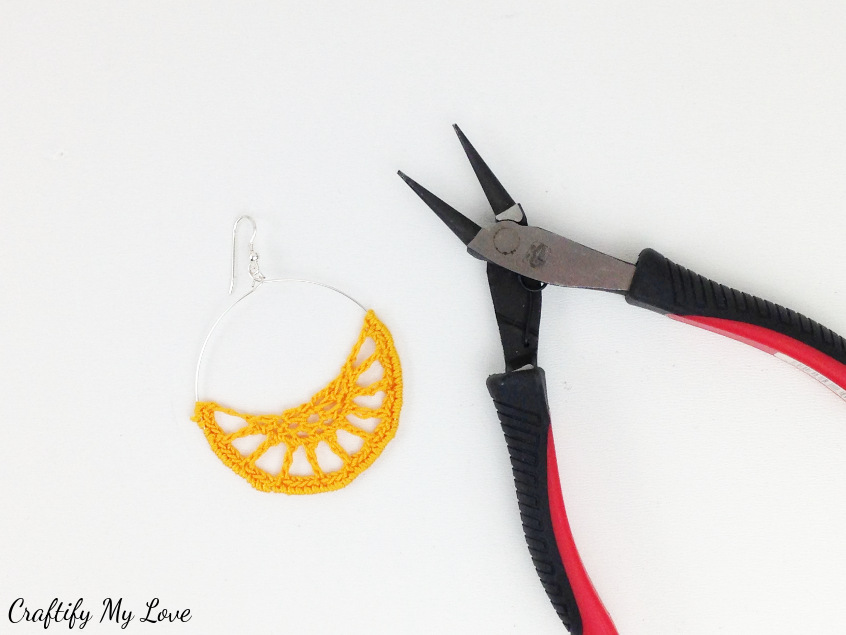 Add earring hooks to your crocheted hoop earrings that are obviously super boho style