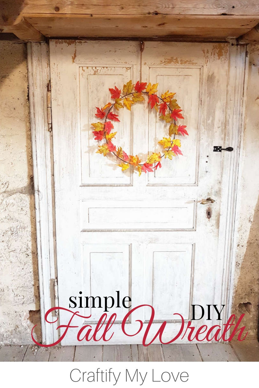 Simple fall wreath DIY from single faux fall leaves, gold wire, and an upcycled metal hoop. Click for detailed step-by-step instructions including video tutorial. #craftifymylove #fallwreath #diywreath #homedecor #frugalcrafts #upcyclingDIY