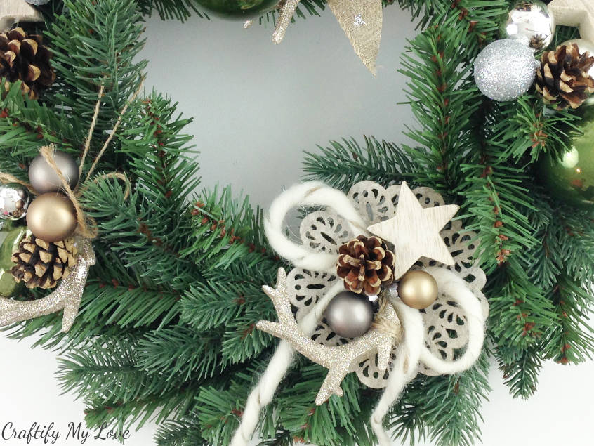 Close up of my sparkly deer antlers felt flower raw wool bow Christmas wreath