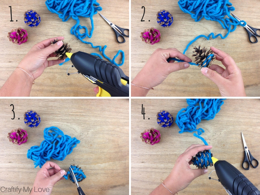 step by step instruction: hot glue yarn to pine cone, wrap yarn around it, cut off and use hot glue to fix yarn to pine cone.