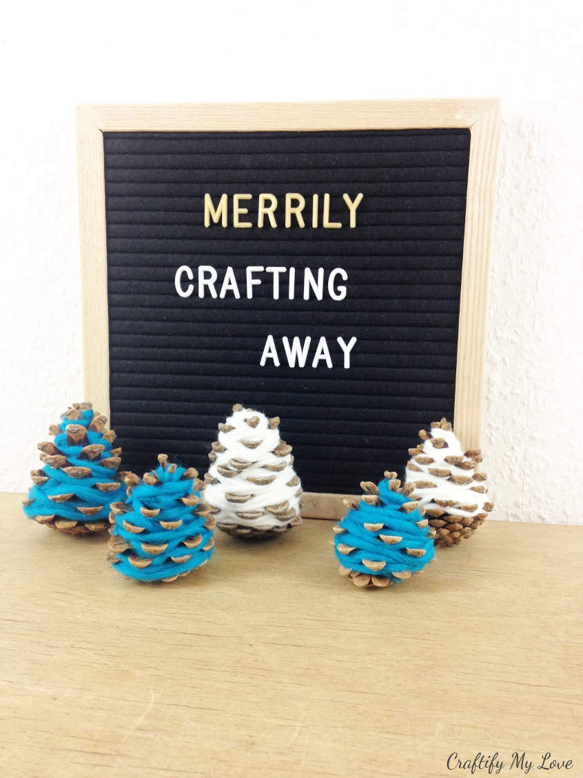 merrily crafting away making DIY Christmas decor nature crafts