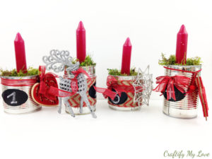 recycled tin cans advent wreath decoration in red and greens for that typical farm house flair
