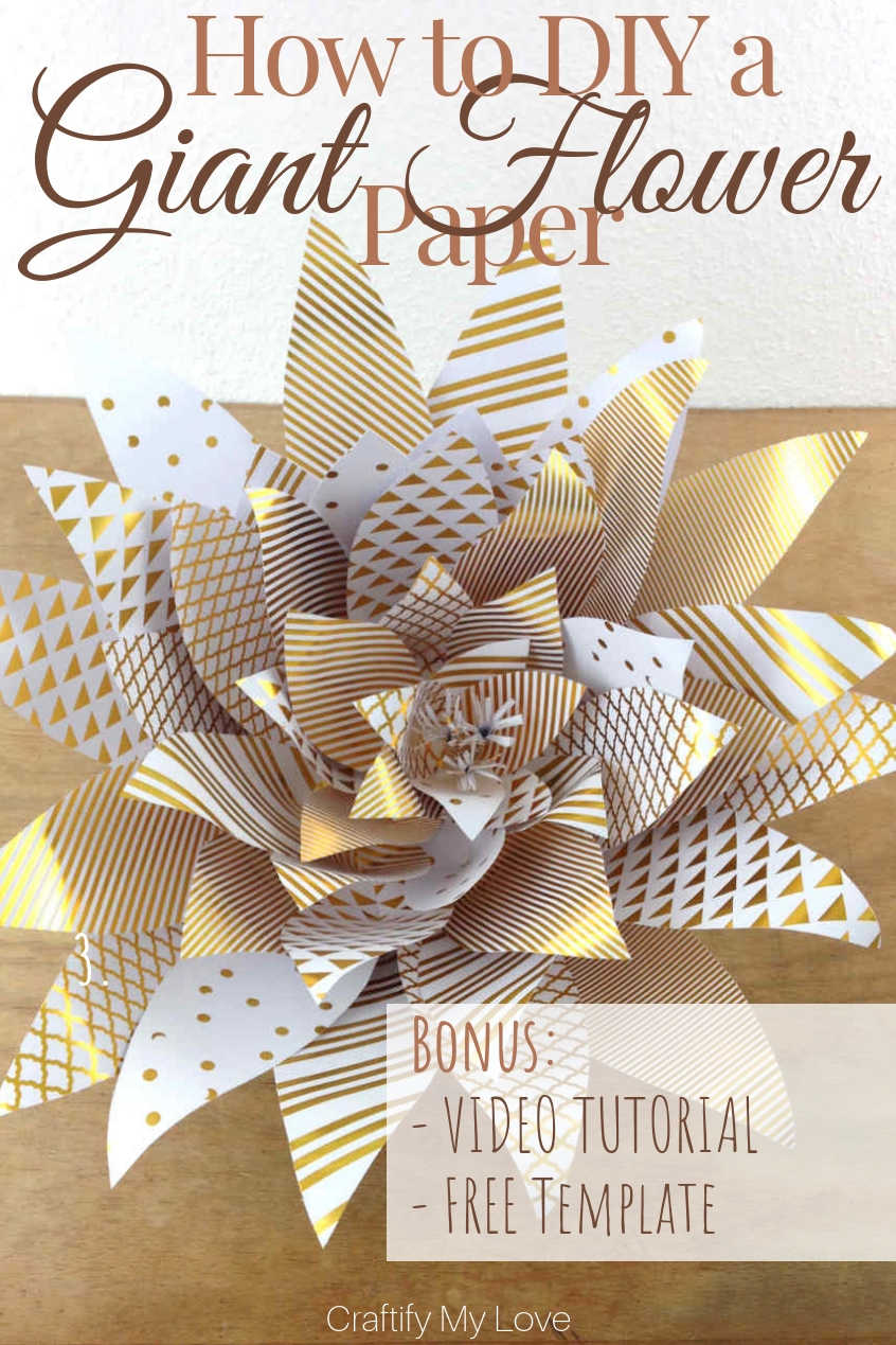 Learn how to DIY a giant paper flowers from scrapbook paper today. They make for awesome photo backdrop and easy DIY decor for weddings, birthdays, and baby showers. They look rather complex, but they are very simple to make. Click for a step-by-step photo and video tutorial and FREE template! #craftifymylove #giantpaperflower #howtomakeagiantpaperflower #weddingdecor #babyshower #DIYdecor #birthdayparty #whiteandgold #freetemplate