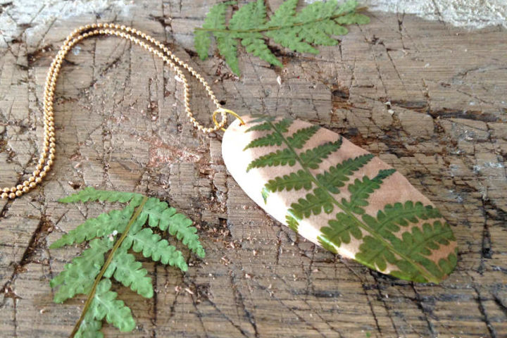 pressed and dried fern wood disc pendant for diy jewelry - a frugal dollar store craft