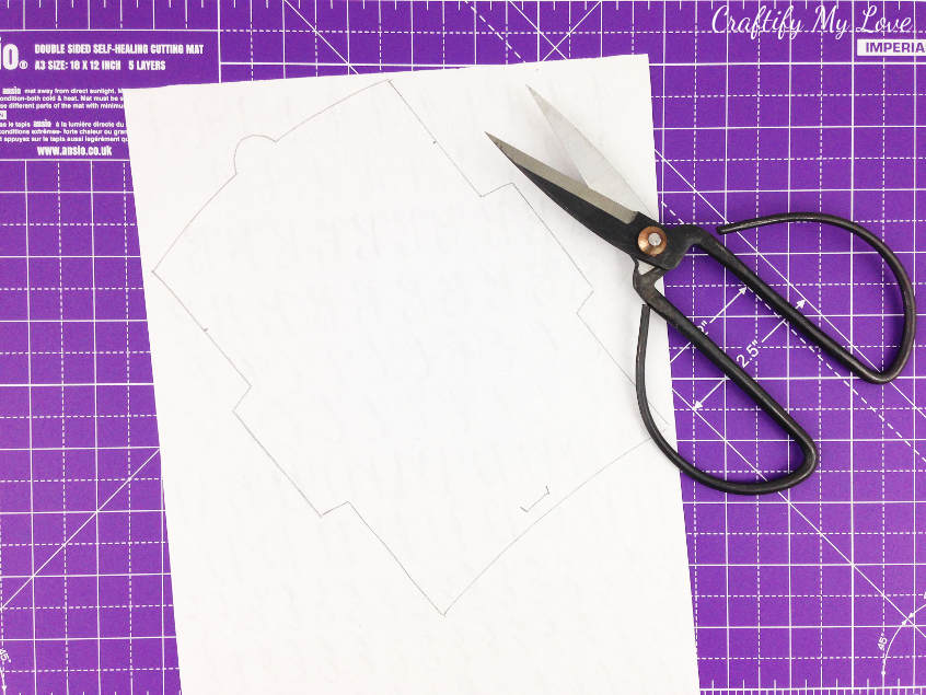 trace and cut the outline of free envelope template onto back of hand lettering practice sheet