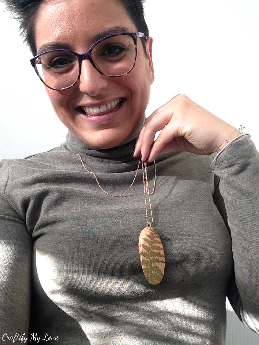 Wearing my handmade wood slice and pressed fern pendant necklace. DIY jewelry is super fun to make!