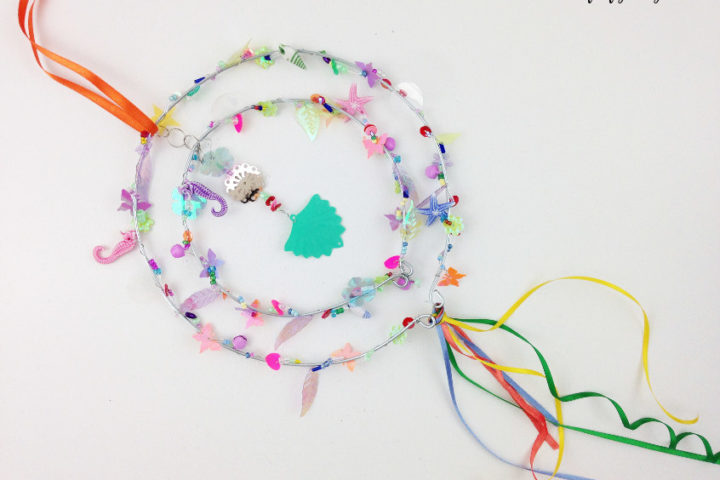 learn how to make a beaded suncatcher DIY to make your garden more colorful