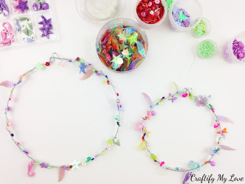 making the rings for a beaded rainbow hoop suncatcher mobile DIY